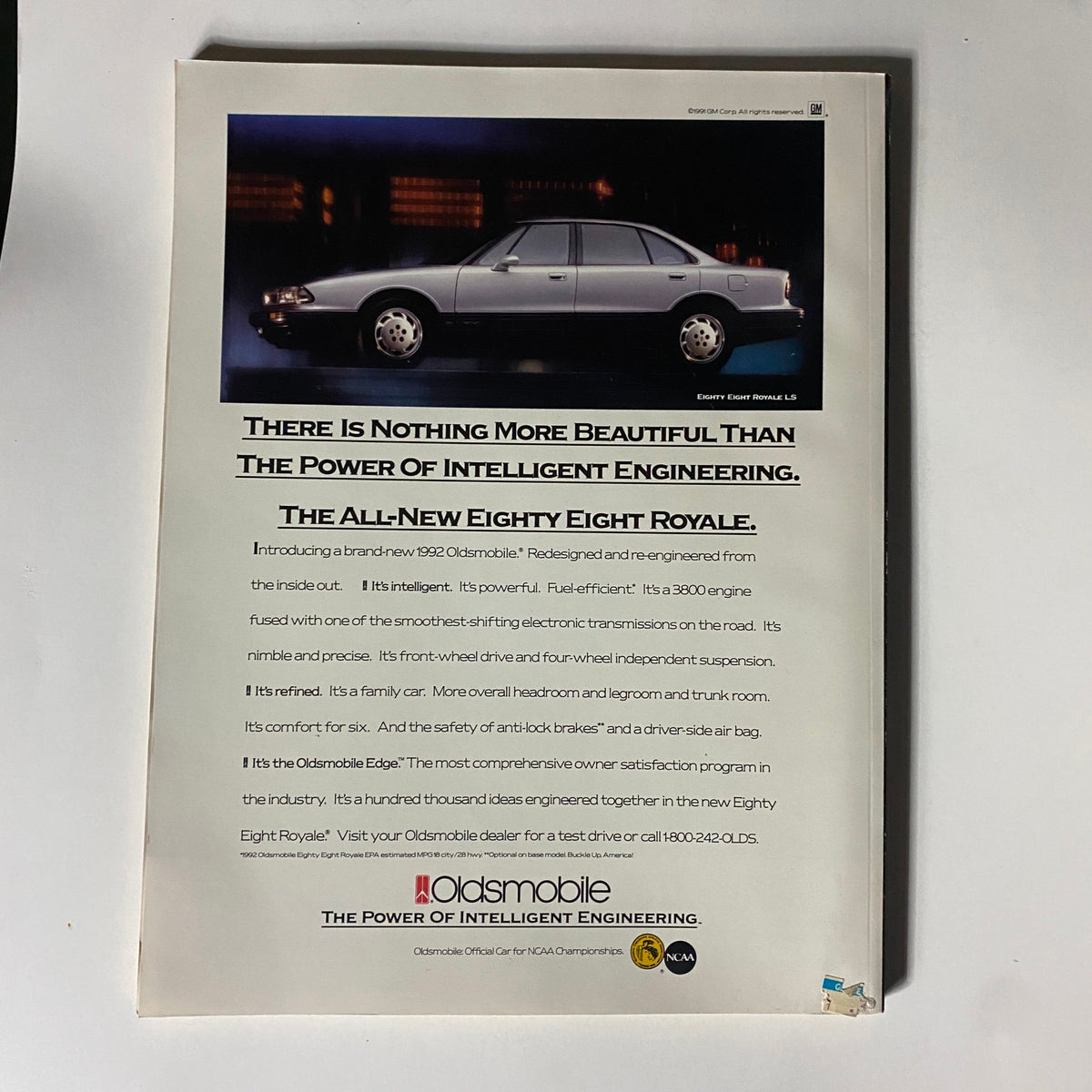Advertisement for the 1992 Oldsmobile Eighty Eight Royale in the NCAA Basketball Preview Magazine 1991-1992, highlighting its features and intelligent engineering.