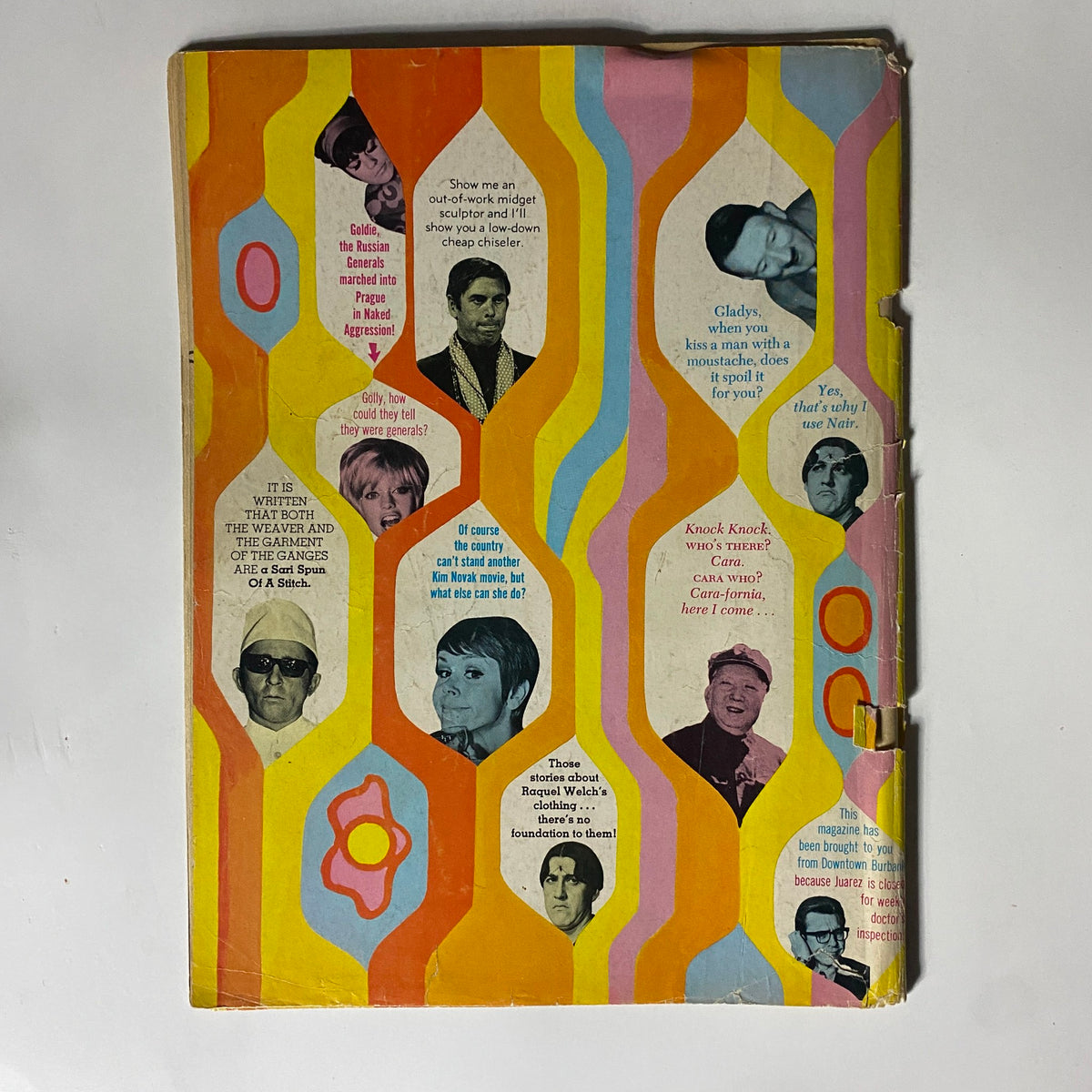 Back cover of the VTG Laugh-In Magazine November 1968 featuring colorful designs and humorous quotes, reflecting the magazine's playful spirit.
