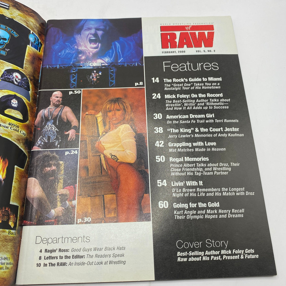Inside spread of WWF Raw Wrestling Magazine February 2000, highlighting key features and articles, including The Rock's Guide to Miami and details on wrestling events.