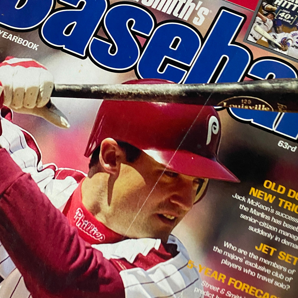 Close-up of Pat Burrell on the cover of Street & Smith's Baseball Yearbook 2004, emphasizing his batting stance and the essence of baseball collectibles.