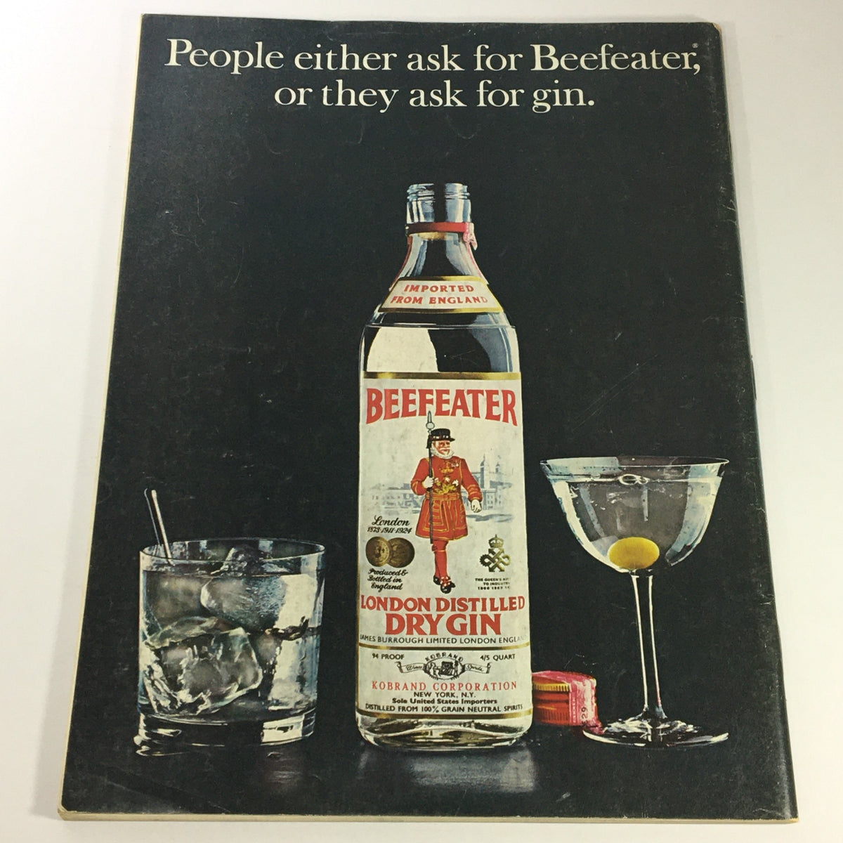 Advertisement from VTG Gourmet: The Magazine of Good Living, March 1974, showcasing Beefeater Gin with a bottle and cocktail glasses.