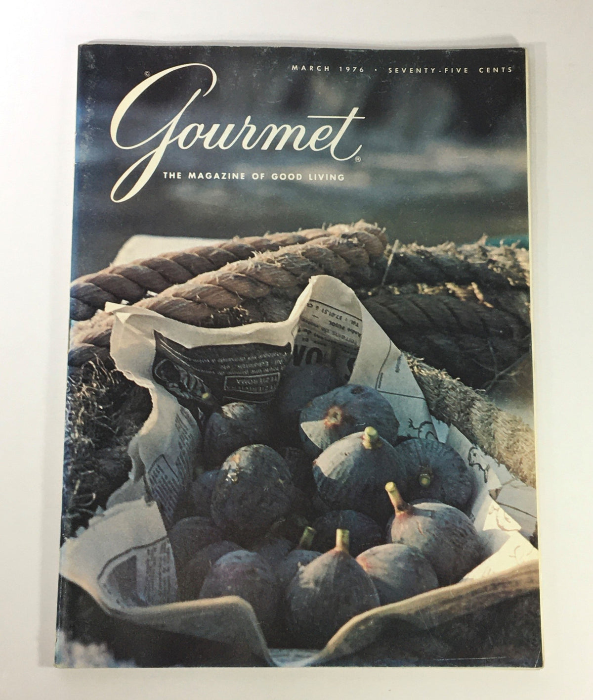 Cover of VTG Gourmet The Magazine of Good Living March 1976 showcasing a basket of figs, highlighting Texas cuisine and lifestyle. A vintage magazine focusing on culinary culture.