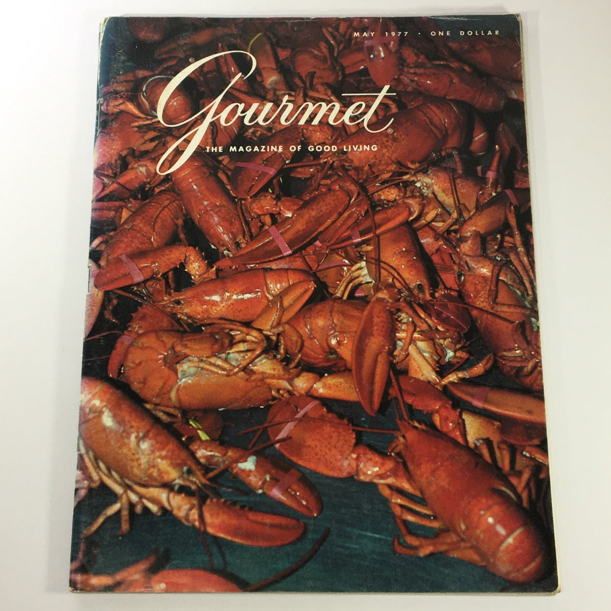 Cover of VTG Gourmet The Magazine of Good Living May 1977 featuring a vibrant display of lobsters, capturing the essence of gourmet dining.