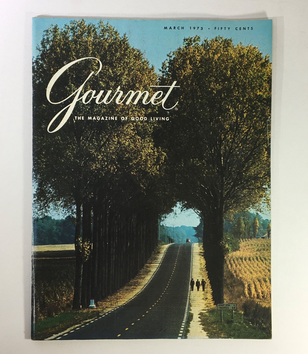 Cover of VTG Gourmet The Magazine of Good Living March 1973 featuring a scenic tree-lined road, emphasizing the theme of good living.