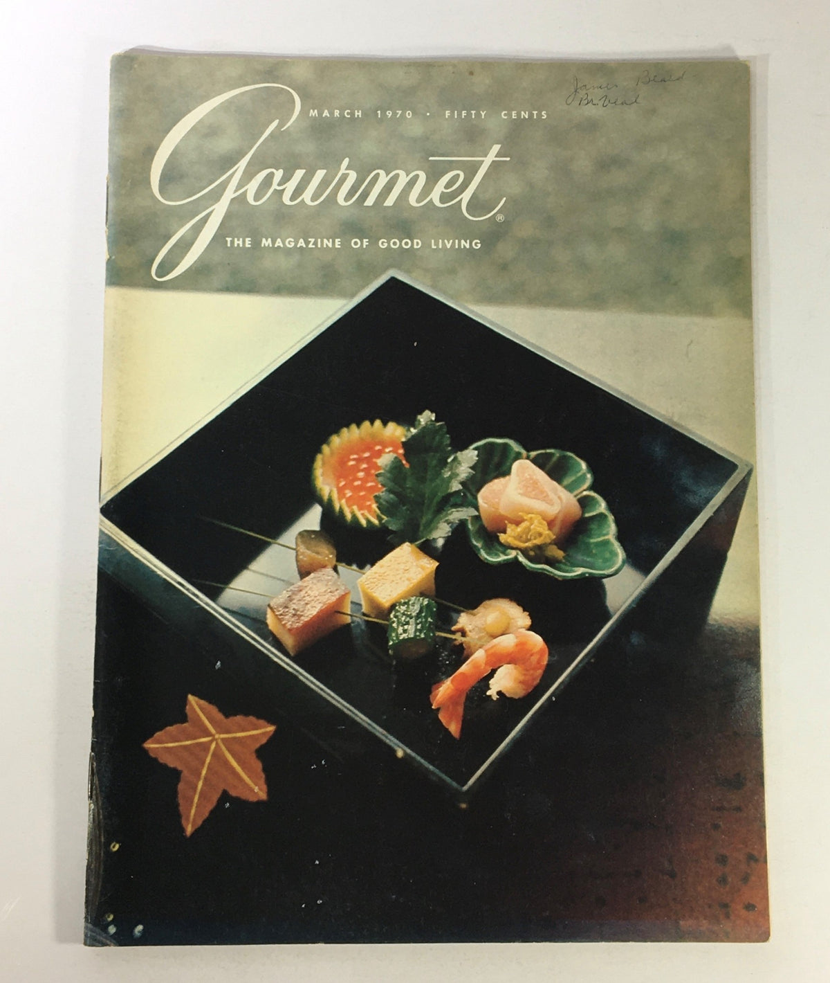 Cover of VTG Gourmet The Magazine of Good Living from March 1970 featuring a decorative platter of gourmet dishes, highlighting the art of fine dining and culinary culture.