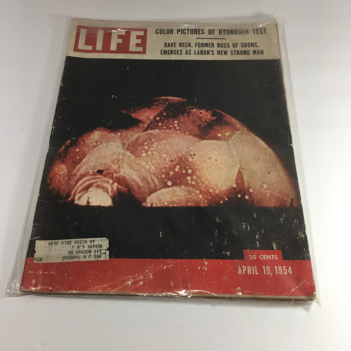 Cover of VTG Life Magazine April 19 1954 featuring color pictures of the Hydrogen Test, with the headline 'COLOR PICTURES OF HYDROGEN TEST.' The magazine showcases historical significance from the early Cold War period.