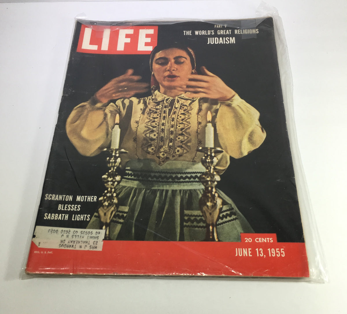 Cover of VTG Life Magazine June 13 1955 featuring a Scranton mother blessing Sabbath lights, depicting Jewish traditions in a vibrant vintage style.