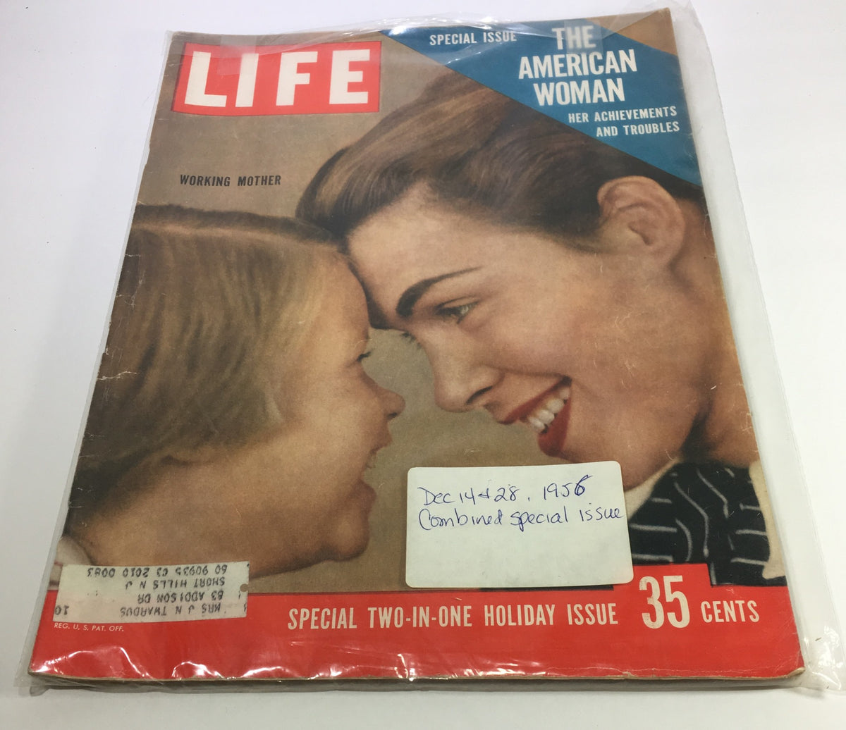 Cover image of VTG Life Magazine from December 14-28, 1956, featuring the theme 'Working Mother & American Women Combined'. The cover showcases two women smiling at each other, highlighting the magazine's focus on female achievements and societal roles during this pivotal time in American culture.