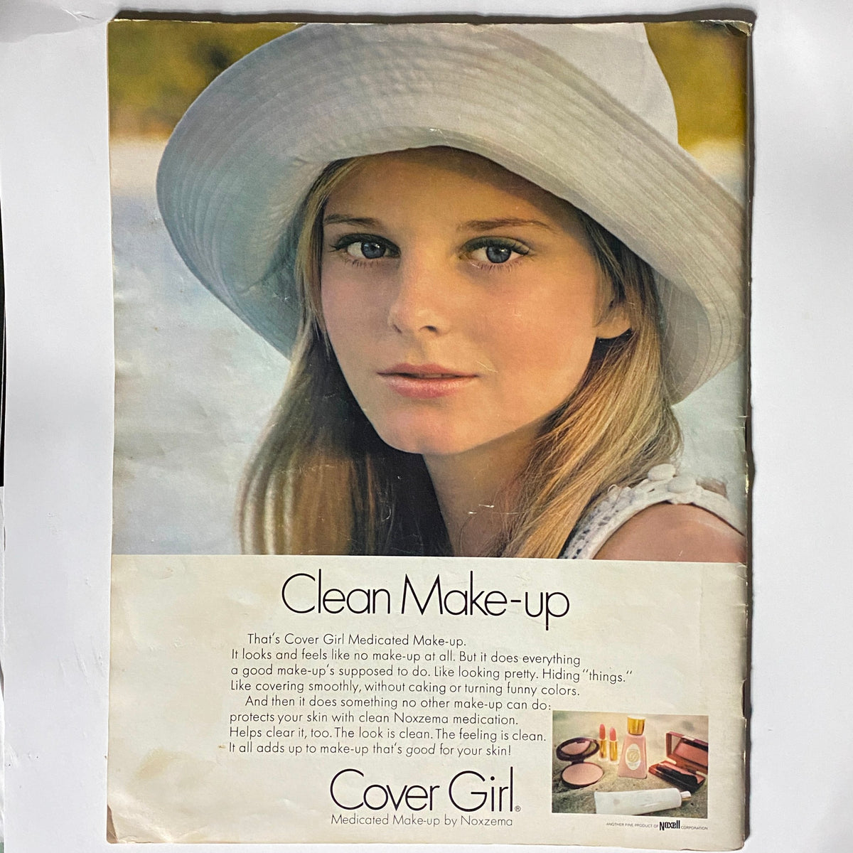 Advertisement featuring a model promoting Cover Girl Clean Make-up in VTG Eye Magazine April 1969, highlighting the beauty trends of the era.