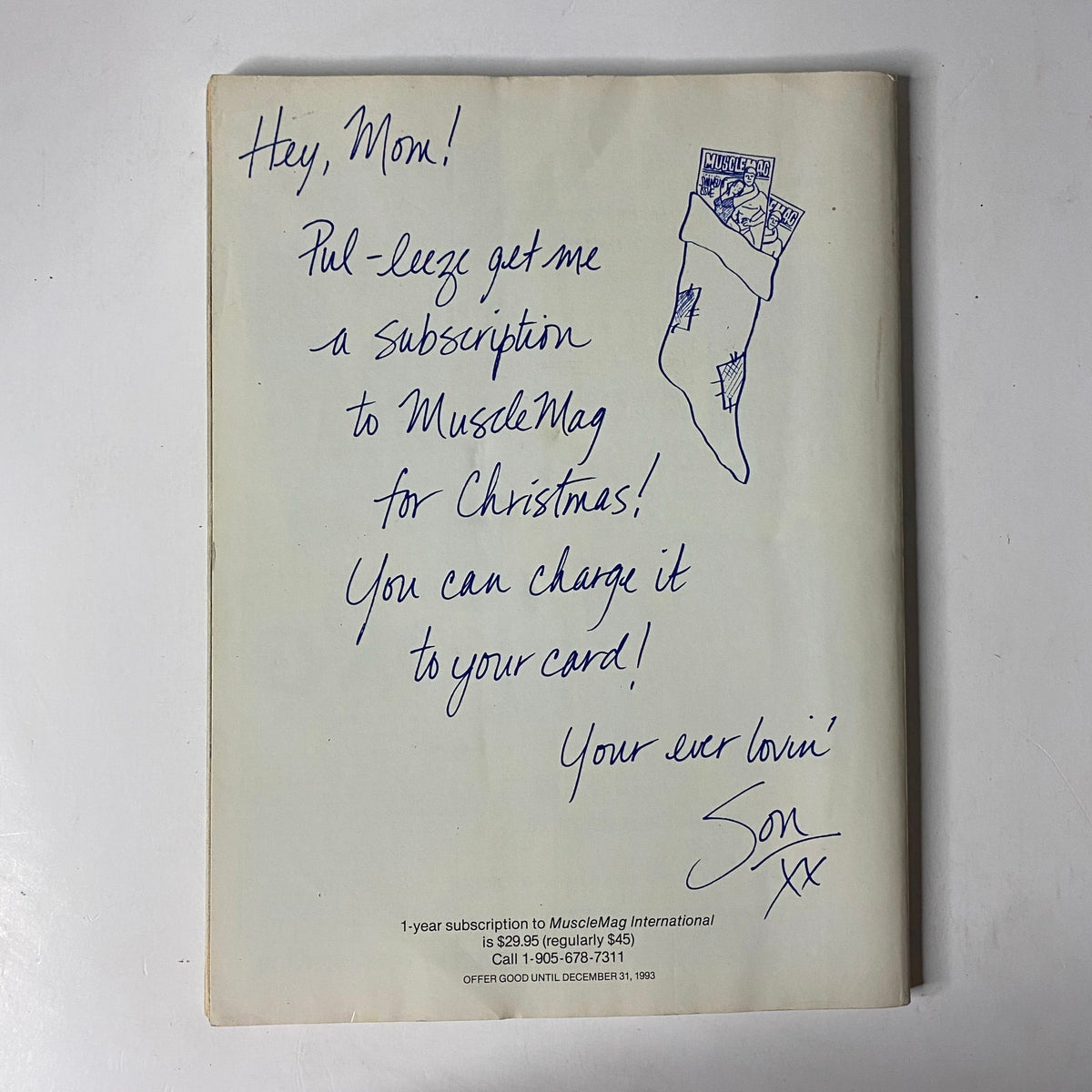 MuscleMag International Magazine July 1999 No. 205 Torrie Wilson – A playful handwritten note asking for a subscription to MuscleMag for Christmas, signed 'Son', accompanying the magazine cover.