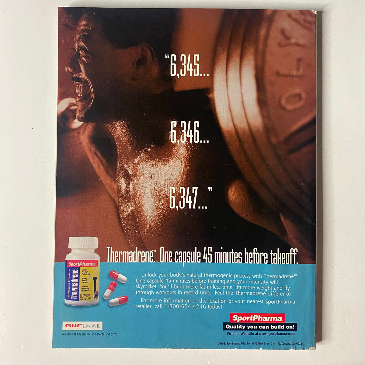 Muscle & Fitness Magazine February 1999 Vol 60 No 2 Carmen Electra, displaying an advertisement for Thermadrine, emphasizing fitness and nutrition support.