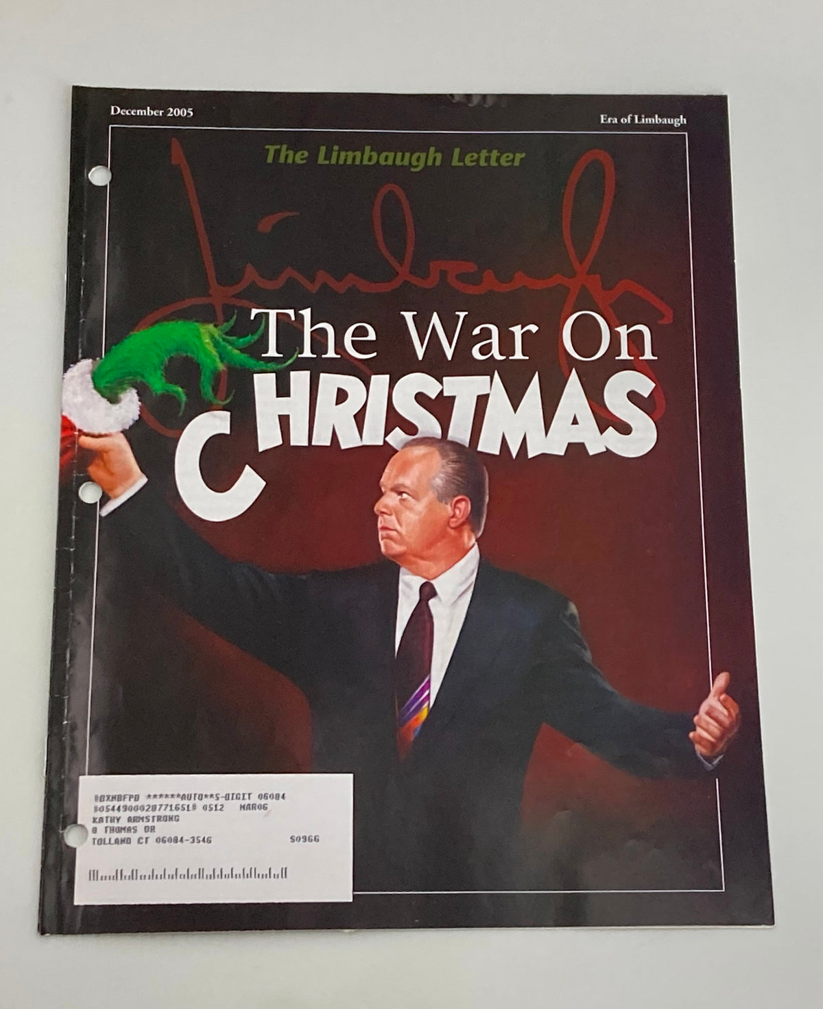Cover of the Rush Limbaugh Letter Newsletter Magazine from December 2005, featuring the title 'The War On Christmas' with a depiction of a man in a suit holding a festive Santa hat. This vintage magazine addresses the Grinch War on Christmas, capturing cultural debates of the holiday season.