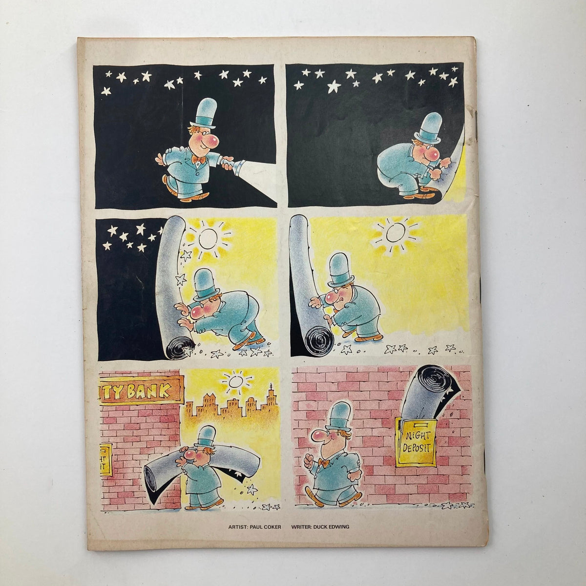 Mad Magazine June 1990 No. 295 Back To The Future II cover illustration featuring a humorous comic strip by artist Paul Coker and writer Duck Ewing, showcasing a character with a flashlight and a rolled-up carpet under a starry sky and sunny backdrop.