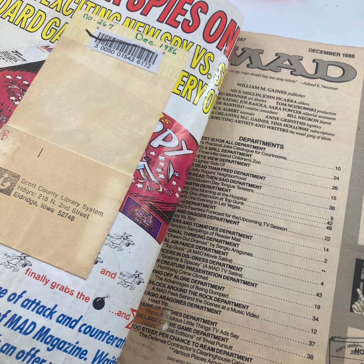 Inside spread of Mad Magazine December 1986 No. 267, displaying the table of contents with various featured sections and satirical content.