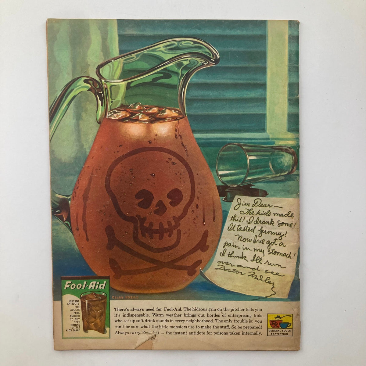 Image of Mad Magazine December 1961 No. 67 featuring a humorous illustration of a pitcher labeled 'Fool-Aid' with a skull symbol and handwritten note. This vintage magazine encapsulates iconic satire from its era.