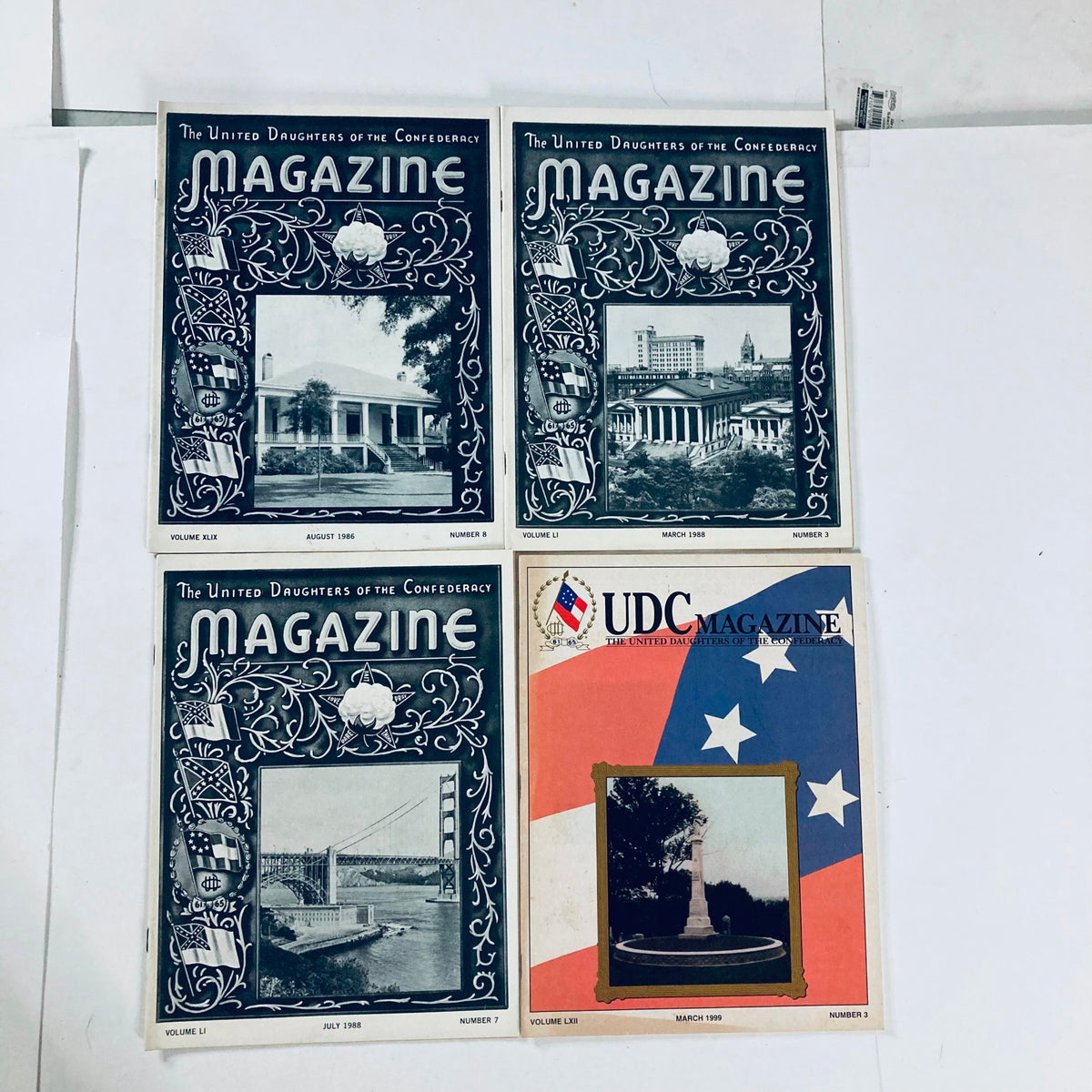 VTG The United Daughters of The Confederacy Magazine featuring covers from August 1966, March 1968, July 1968, and March 1999, showcasing historical imagery and themes relevant to Southern heritage.
