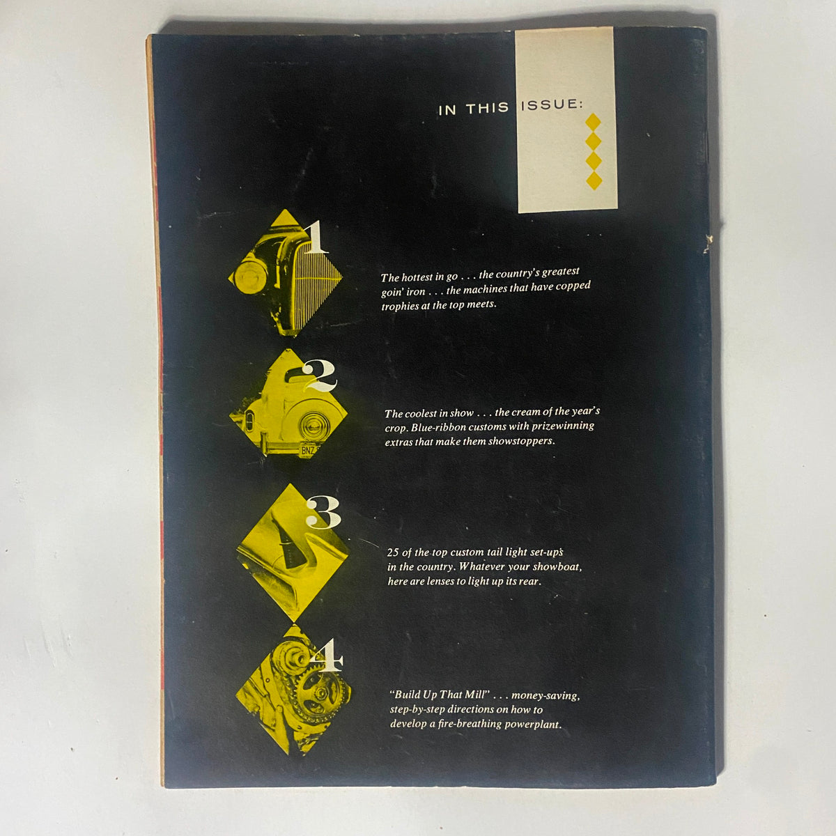 Back cover of the VTG Rod Builder Magazine 1959 No. 5 The Rod Builder Special, highlighting featured topics including custom tail light setups and techniques for enhancing automotive performance.