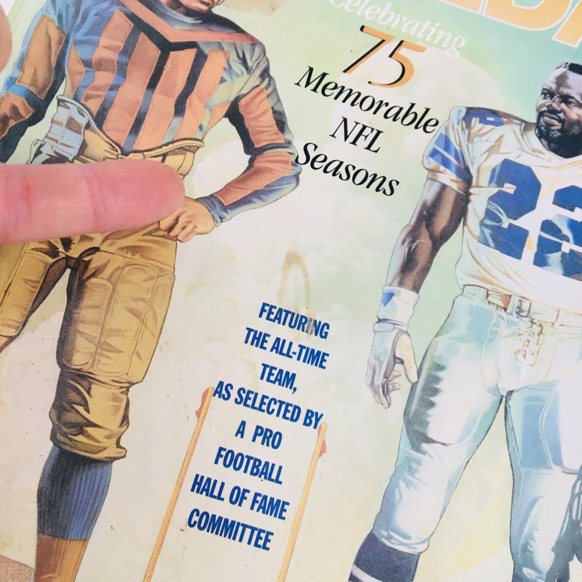 Close-up of the Gameday Magazine September 25, 1994 cover, highlighting the focus on 75 memorable NFL seasons, with notable player statistics and a commemorative design.