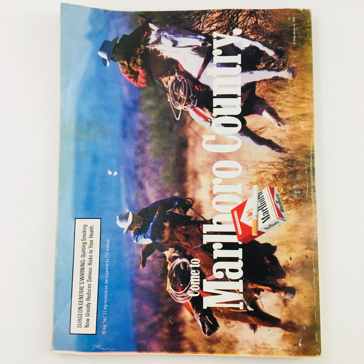 Cover of the Marlboro advertising brochure featuring cowboys on horseback, titled 'Come to Marlboro Country'.