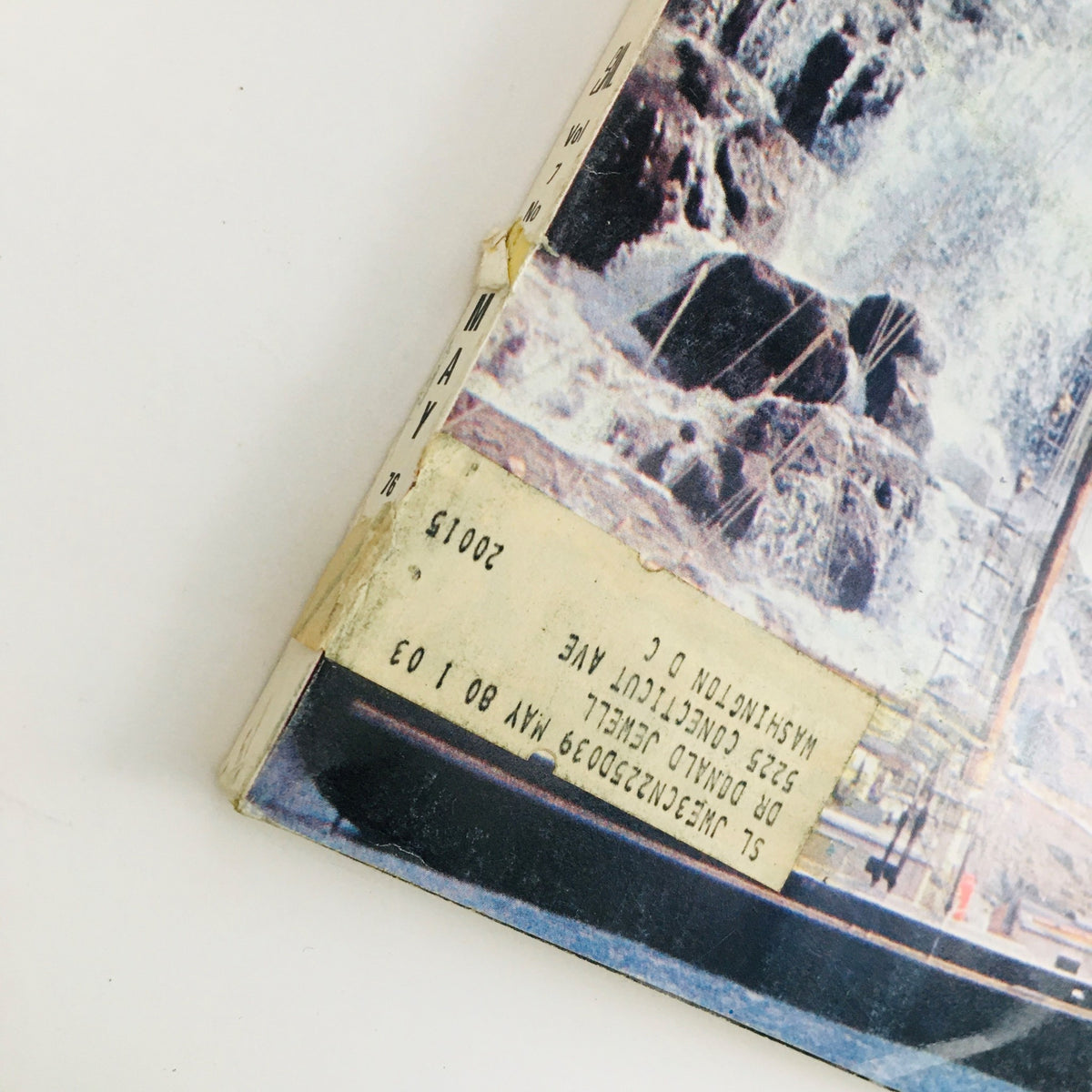 Spine view of Sail Magazine May 1976 showcasing the publication details and vintage address label along the edge.