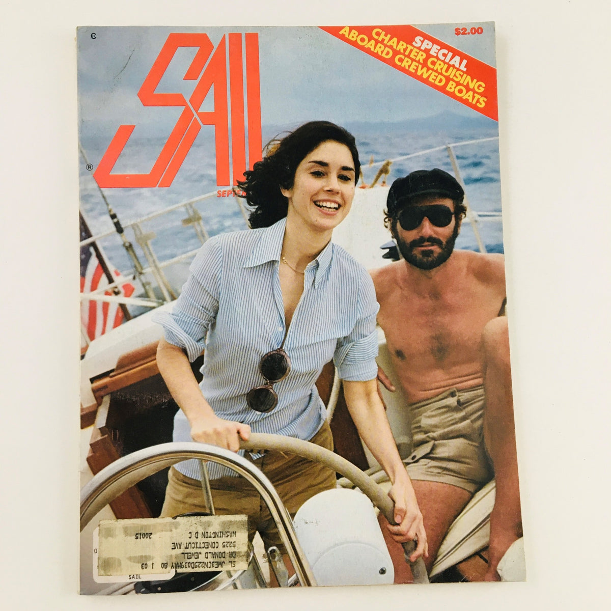 Cover of Sail Magazine September 1979 featuring lively sailing scene with a smiling woman at the helm and a man aboard, titled 'Diggin the Ditch: Cruising the Intracoastal Waterway'.