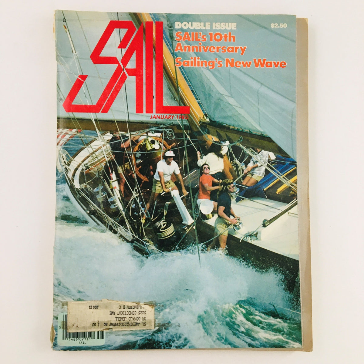 Cover of Sail Magazine January 1980 featuring the title 'Sail's 10th Anniversary Sailing's New Wave', showcasing a group of sailors on a boat amidst ocean waves.
