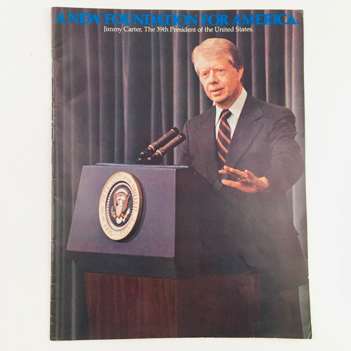 Cover of 'A New Foundation For America: Jimmy Carter, The 39th President of the United States', featuring Jimmy Carter speaking at a podium with the presidential seal.