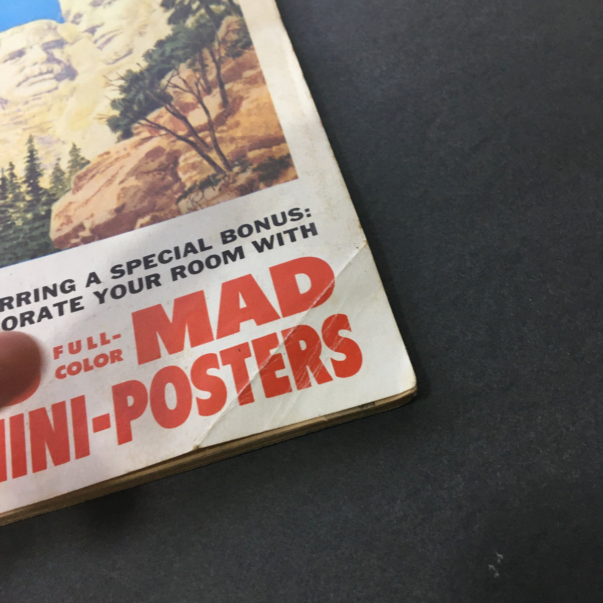 Cover detail of Mad Special Number Four June 1971, featuring Mount Rushmore and a promotion for full-color mini-posters with some wear and tear.