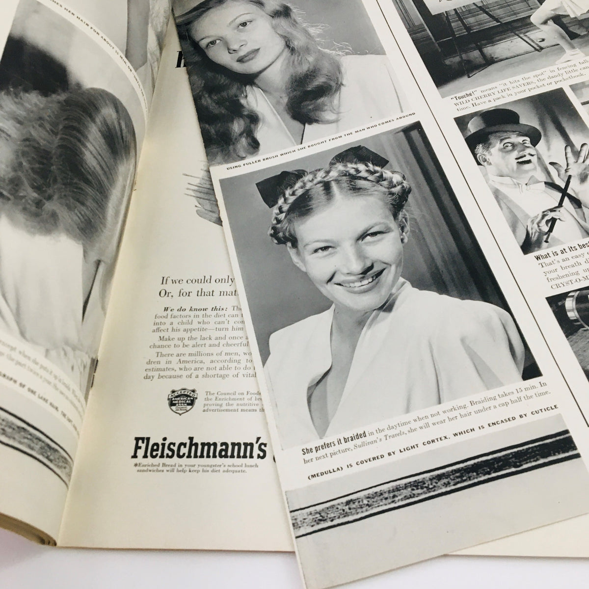 Inside pages of VTG Life Magazine November 24 1941 showcasing vintage hairstyles and advertisements including a feature on 'Fleischmann's'.