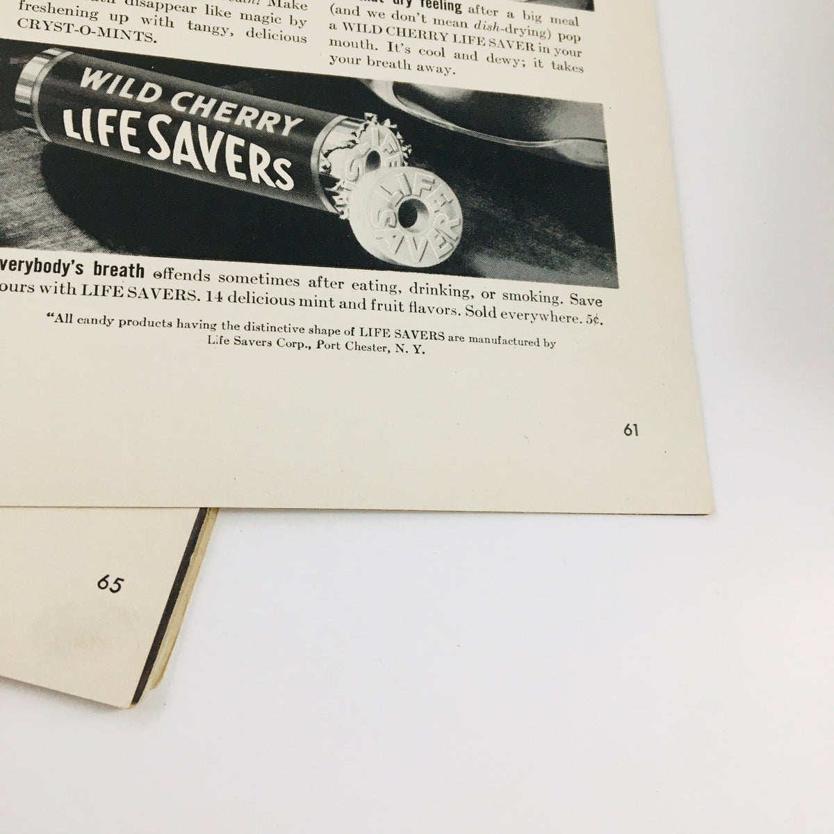 Page 61 of VTG Life Magazine November 24 1941 displaying an advertisement for Wild Cherry Life Savers candy, highlighting its refreshing qualities.