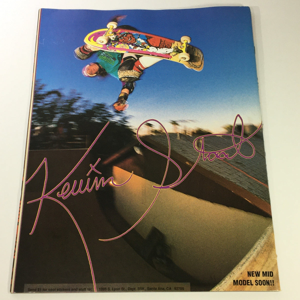 Back cover of Thrasher Magazine December 1989 showcasing a skateboarder in mid-air, emphasizing the dynamic nature of skateboarding and the culture surrounding it.