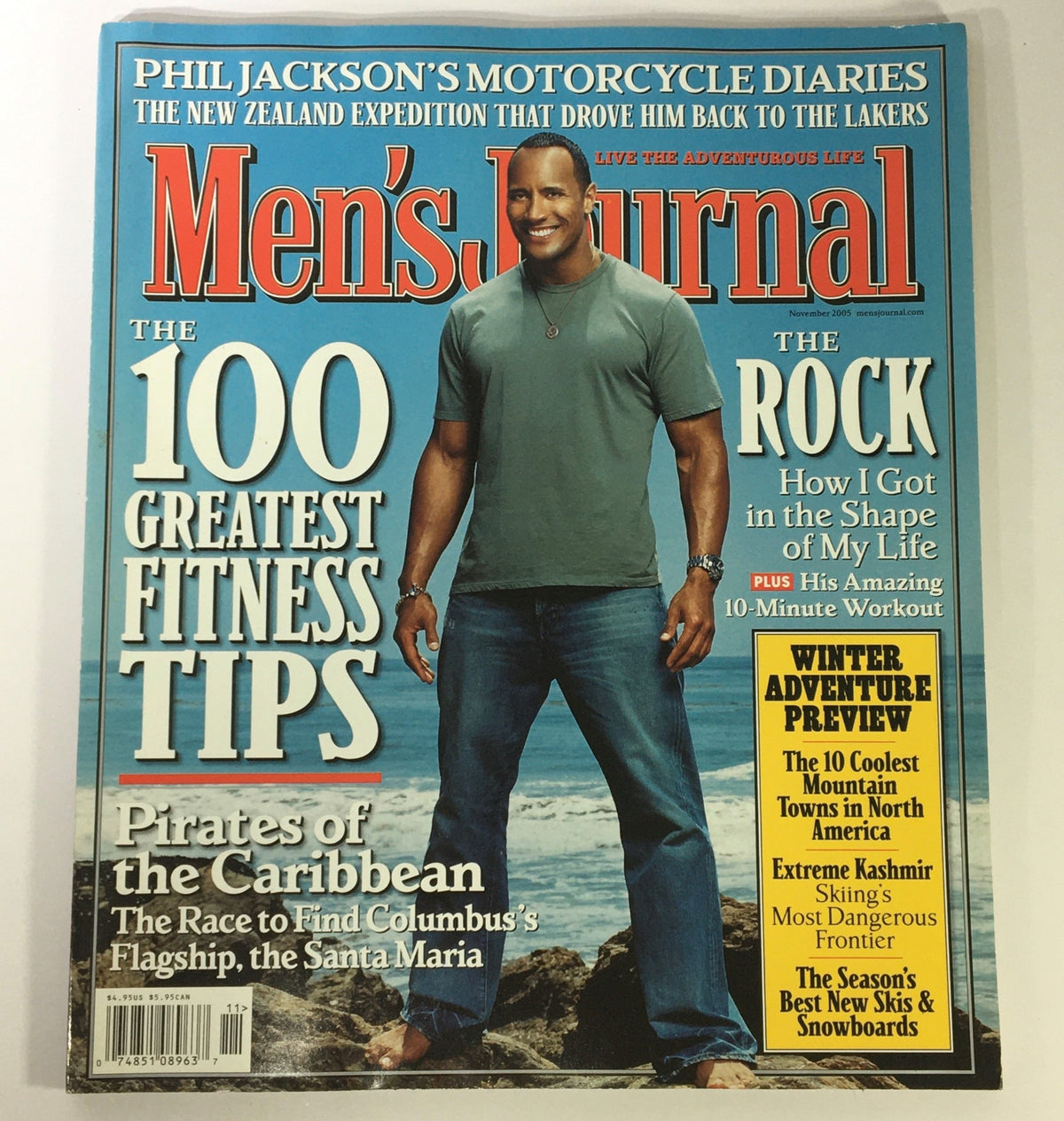 Men's Journal Magazine November 2005 featuring Dwayne "The Rock" Johnson on the cover, showcasing fitness tips and adventure preview content.