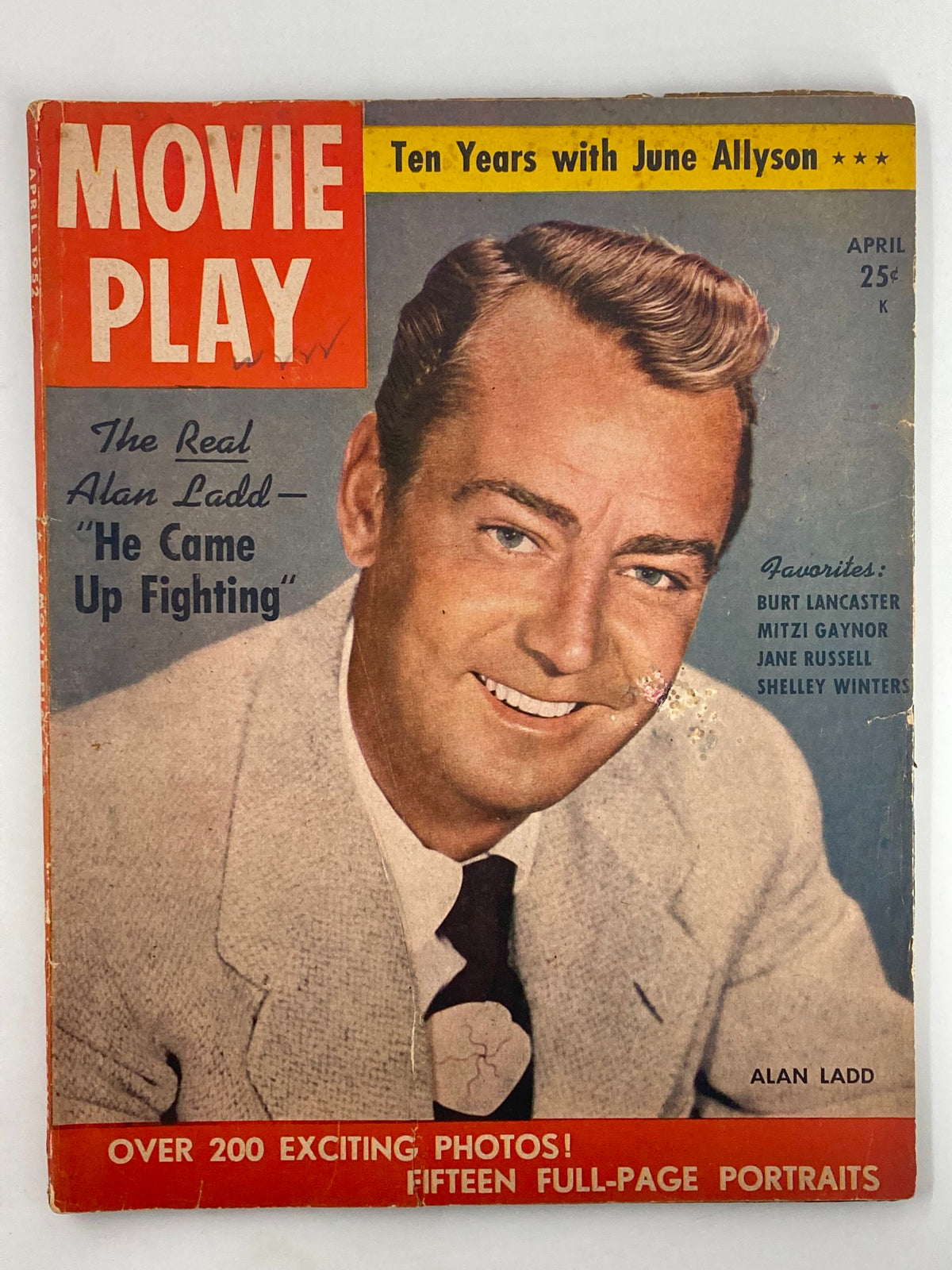 Cover of VTG Movie Play Magazine April 1952 featuring Alan Ladd smiling, listing Burt Lancaster and other stars as favorites, and showcasing vintage Hollywood aesthetics.