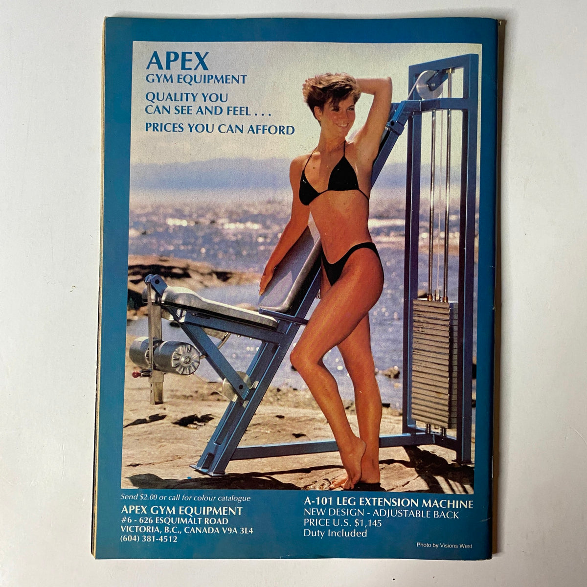 Back cover of MuscleMag International Magazine October 1986, advertising APEX gym equipment with an image of a model demonstrating fitness apparel.