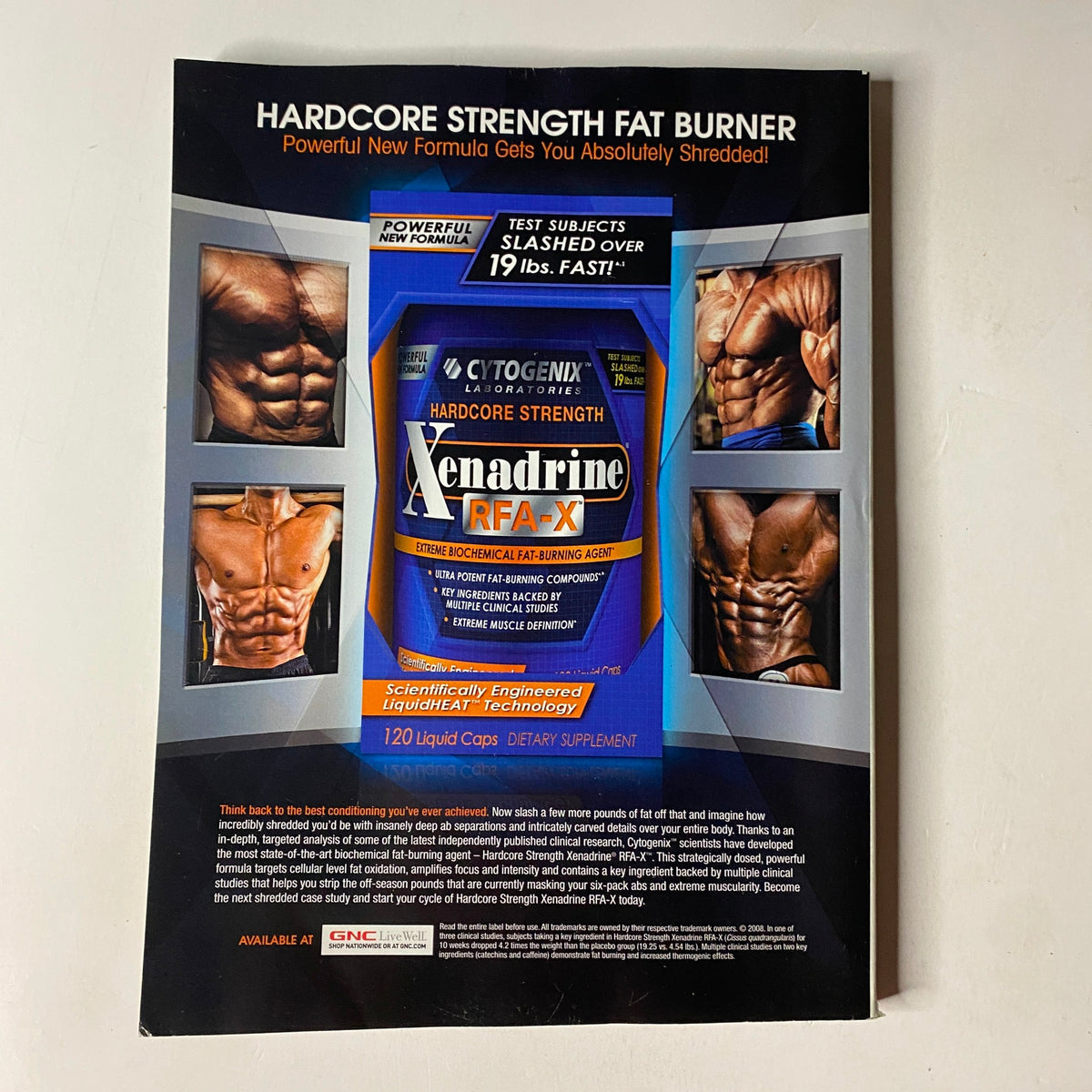 Advertisement page from MuscleMag International Magazine March 2009 No. 322 featuring Hardcore Strength Fat Burner, promoting muscle definition and fitness.