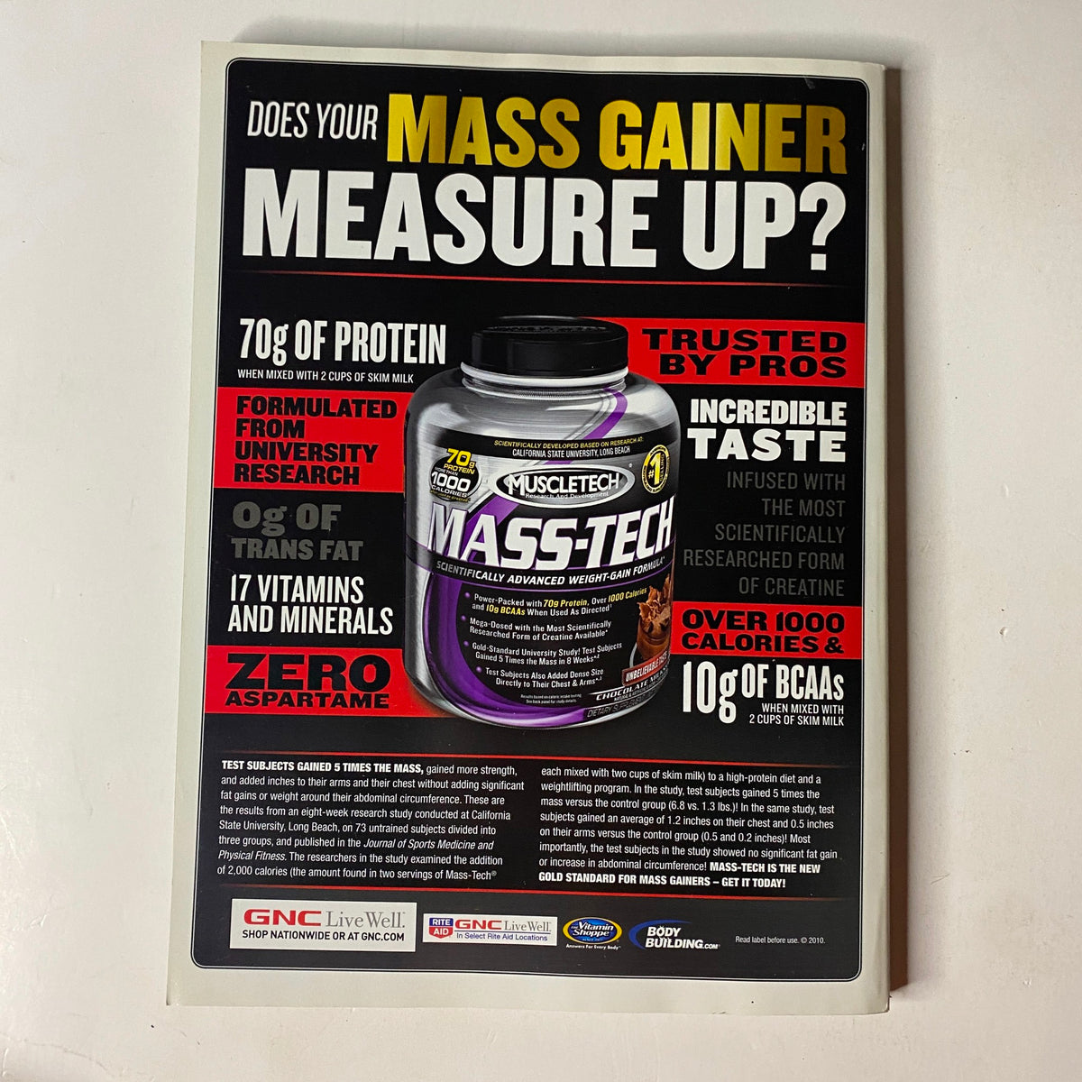 Advertisement for MuscleTech Mass Gainer featuring detailed nutritional information in MuscleMag International Magazine January 2011, No. 344.