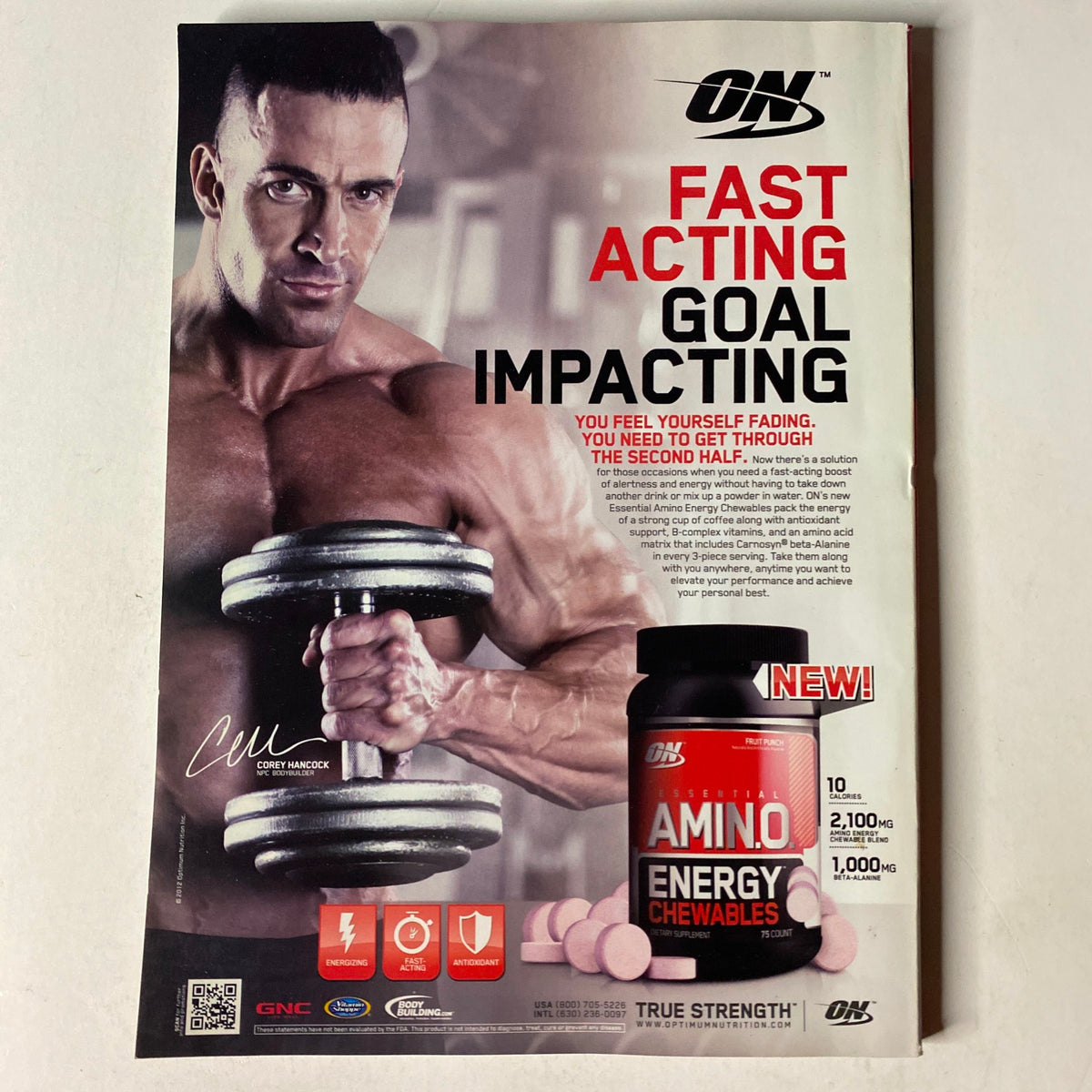 MuscleMag International Magazine May 2012 advertisement promoting amino energy chewables with a muscular model demonstrating fitness and strength.