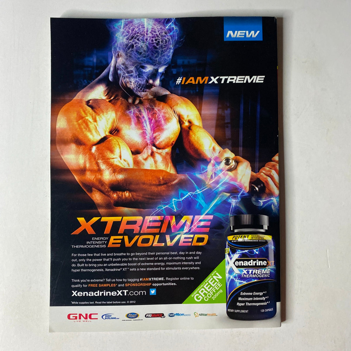 Advertisement for Enadrine Xtreme Thermofit, promoting energy enhancement with the slogan #IAMXTREME, featured in MuscleMag International Magazine November 2012 issue with Jay Cutler on the cover.