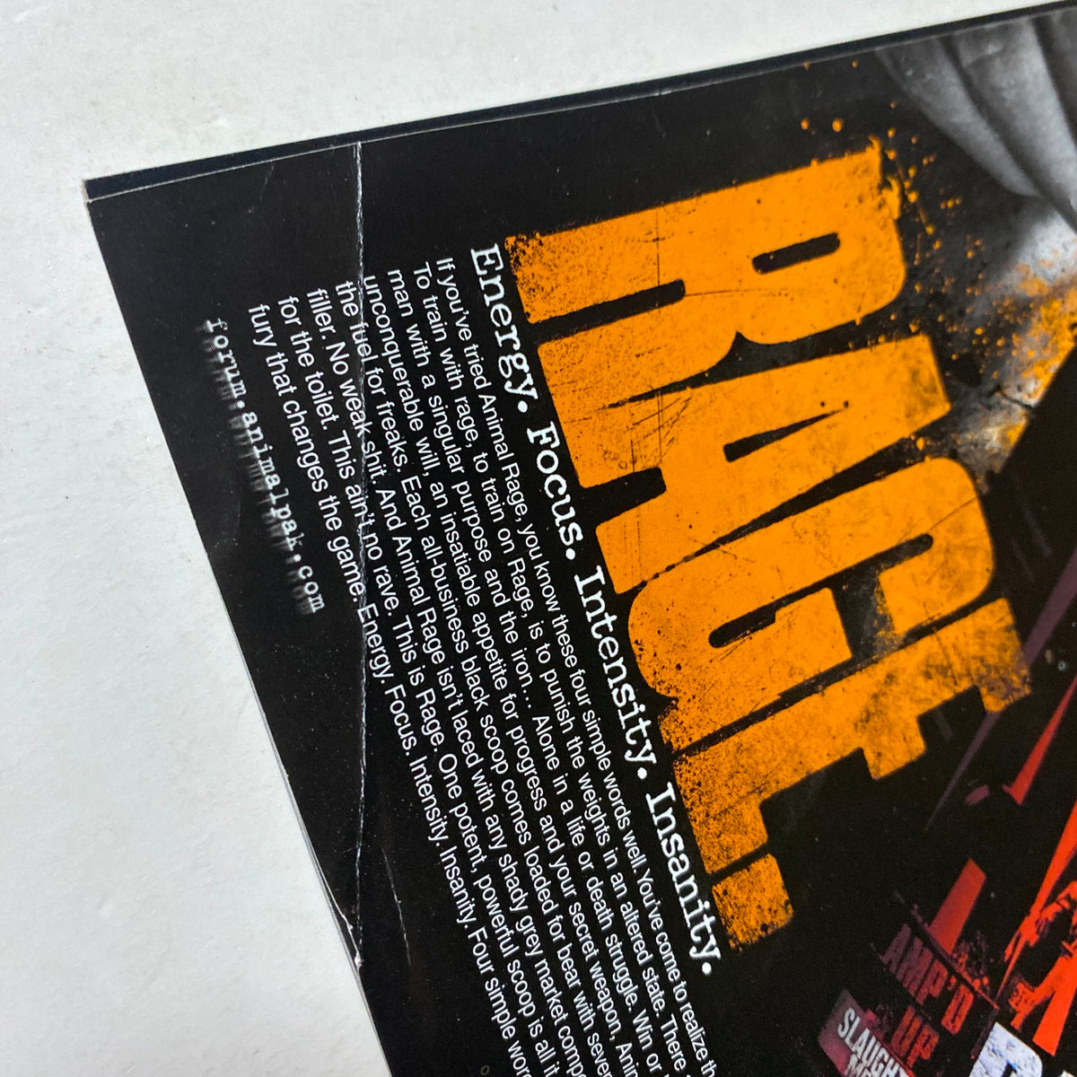 Close-up of the Rage pre-workout supplement advertisement featured in MuscleMag International Magazine August 2012, emphasizing energy, focus, and intensity, issue #363 by Robert Kennedy.
