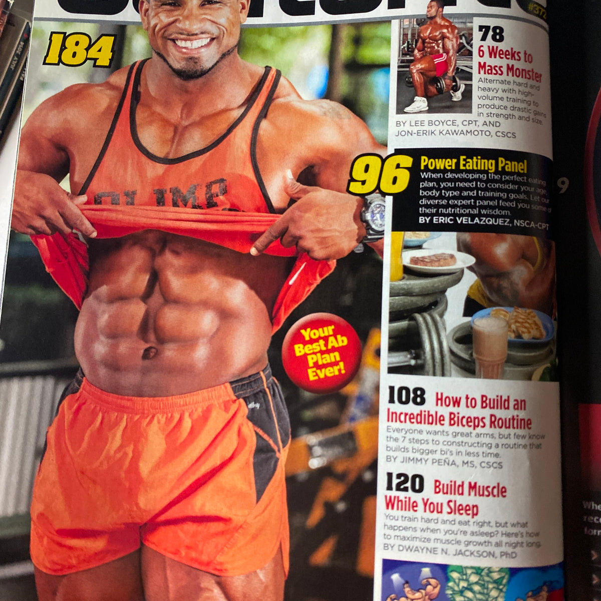Inside page of MuscleMag International Magazine May 2013 #372 displaying a fitness model demonstrating an ab workout and nutritional advice.