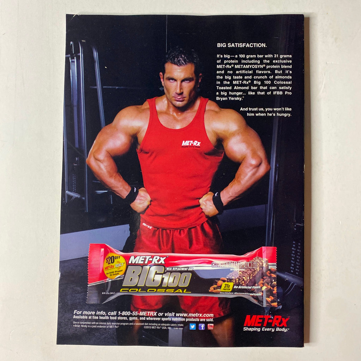 MuscleMag International Magazine May 2013 #372 featuring Quincy Winklaar, showcasing a muscular fit man in a red outfit promoting MET-Rx Big 100 Colossal protein bar with a focus on bodybuilding and fitness.