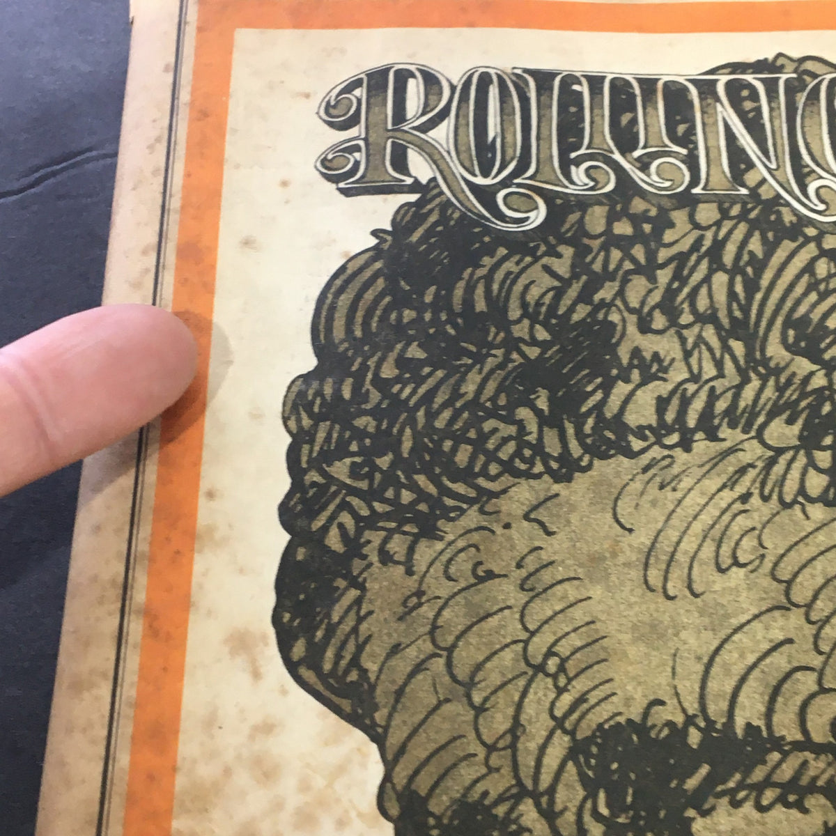 Close-up view of the cover of the Rolling Stone Newspaper March 2, 1972 issue, displaying Bob Dylan's illustration alongside details of articles by Anthony Scaduto.
