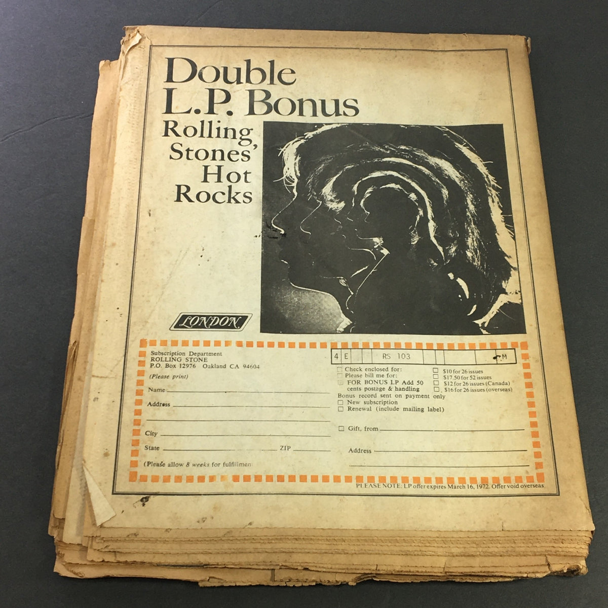 View of the back cover of the VTG Rolling Stone Newspaper March 2 1972 #103 showcasing 'Double L.P. Bonus Rolling Stones Hot Rocks' advertisements and subscription details.