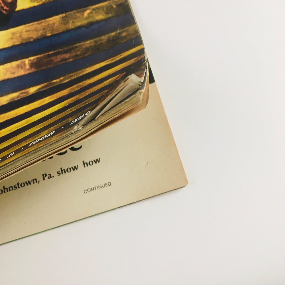 Close-up view of the vintage Life Magazine from April 5, 1968, showcasing the spine and part of the back cover, featuring the title 'The Marvels of Egypt's Past and '2001' A.D.' This collectible magazine highlights significant cultural and historical themes.