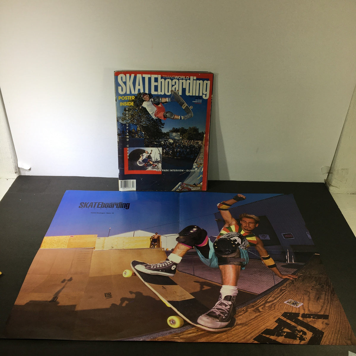 Transworld Skateboarding Magazine April 1989 alongside its original poster, featuring a skateboarder in action, highlighting vintage skate culture.