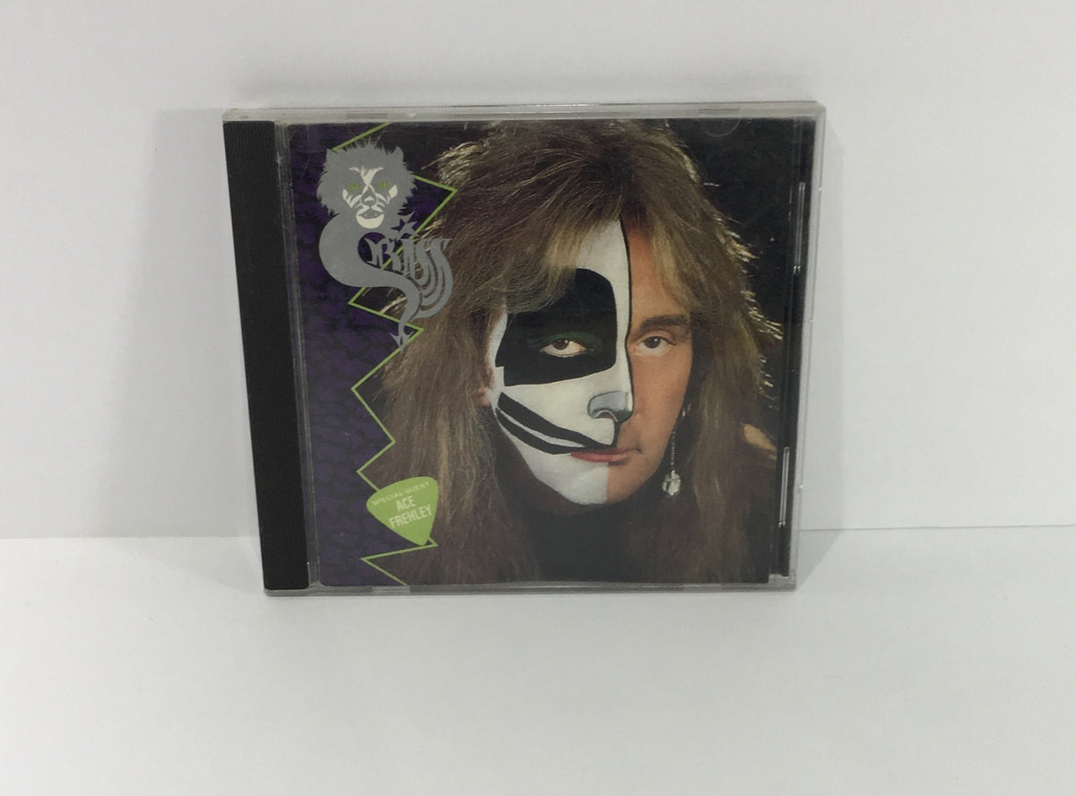 Peter Criss: Criss Cat #1 Audio CD featuring a portrait of Peter Criss with face paint and long hair, capturing the essence of the KISS band member.