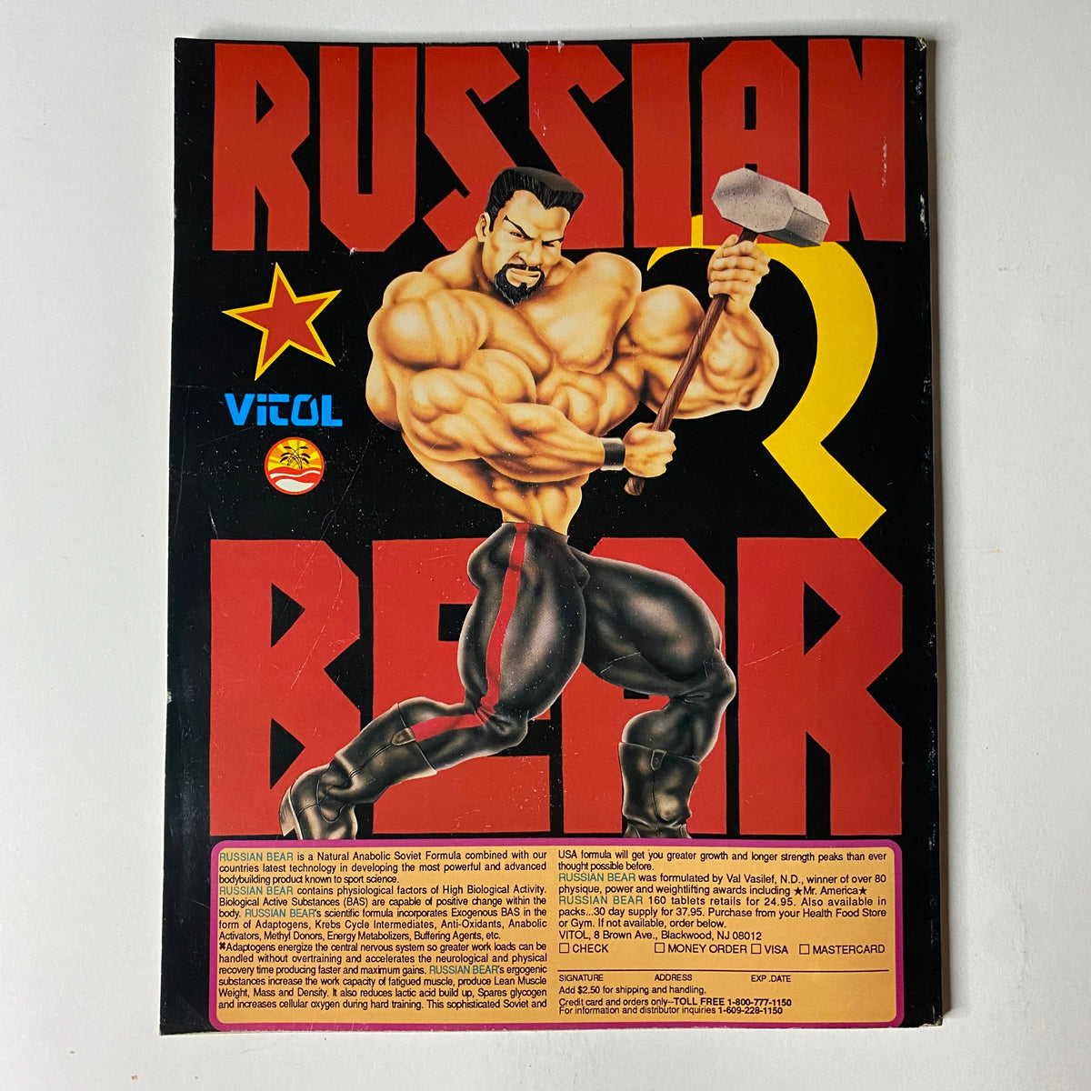 Cover of Muscular Development Magazine December 1990 featuring Jim Quinn and a centerfold poster, showcasing vintage bodybuilding culture with a focus on fitness and strength training.