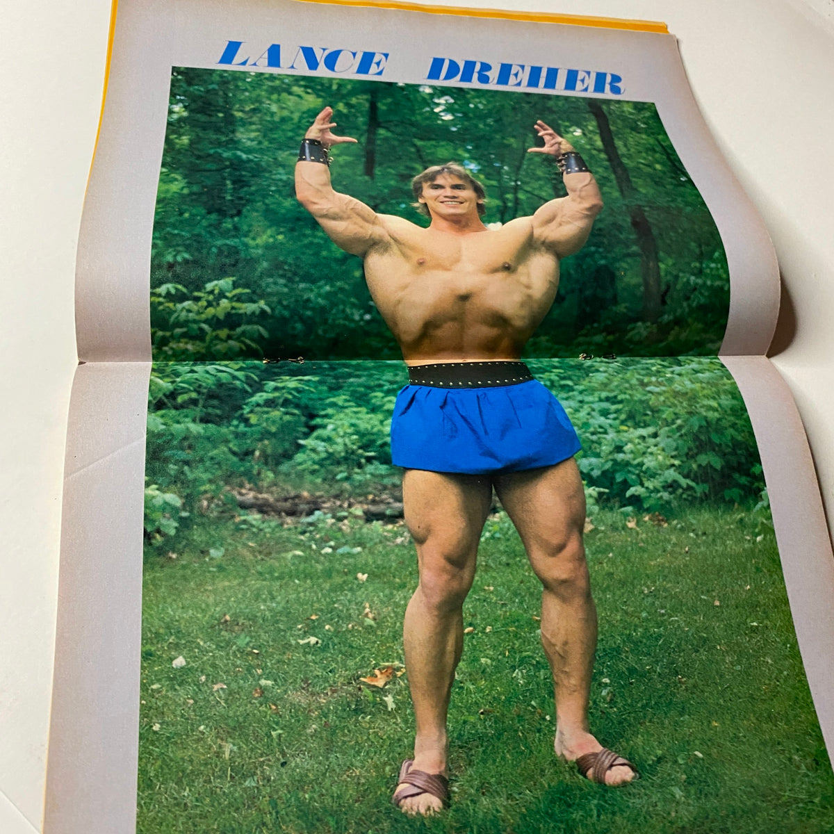 Lance Dreher centerfold from Muscular Development Magazine June 1984, showcasing his muscular physique and iconic bodybuilding pose.