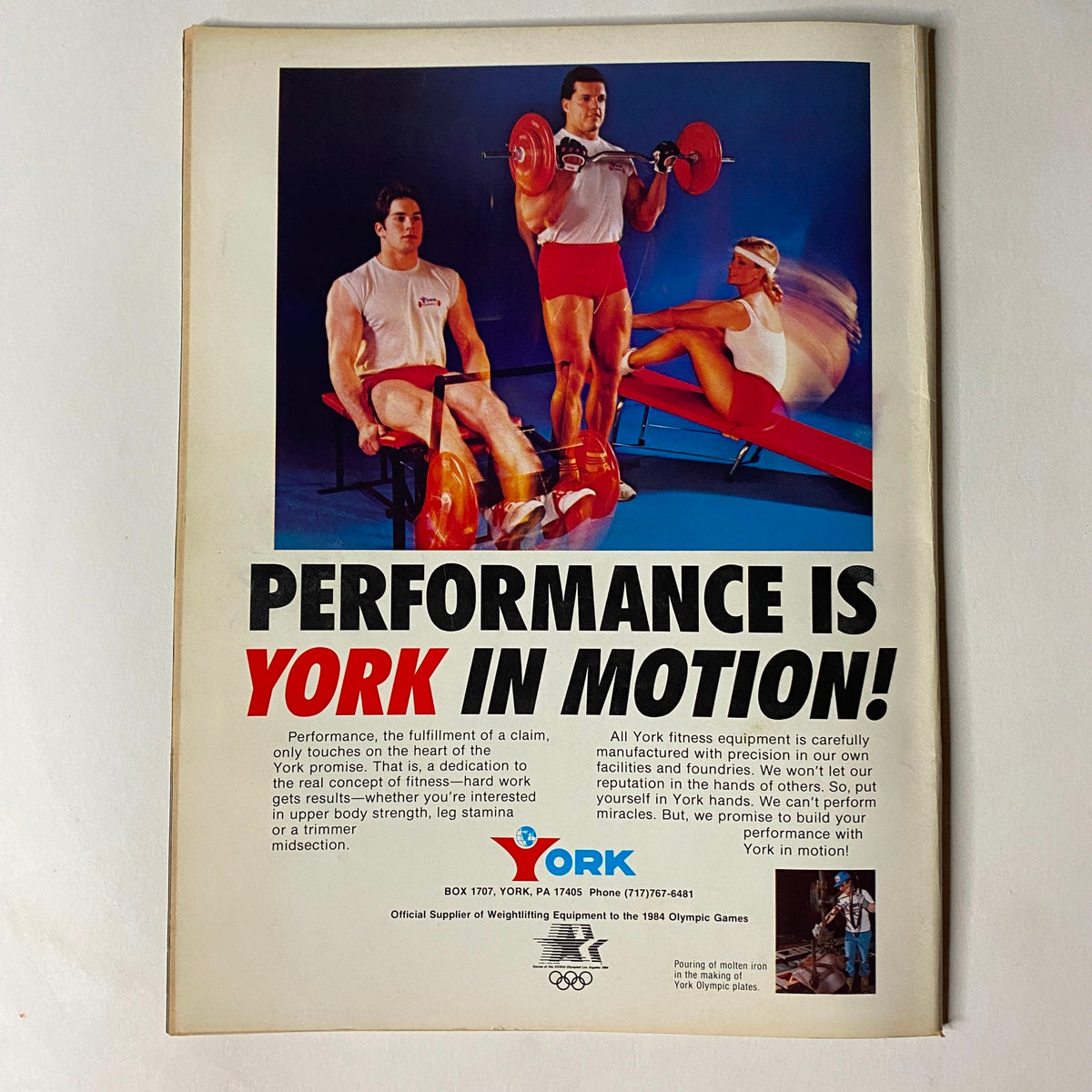 Page from Muscular Development Magazine October 1984 featuring an advertisement for York fitness equipment, emphasizing the theme 'Performance is York in Motion!' showcasing fitness enthusiasts in action with weights.