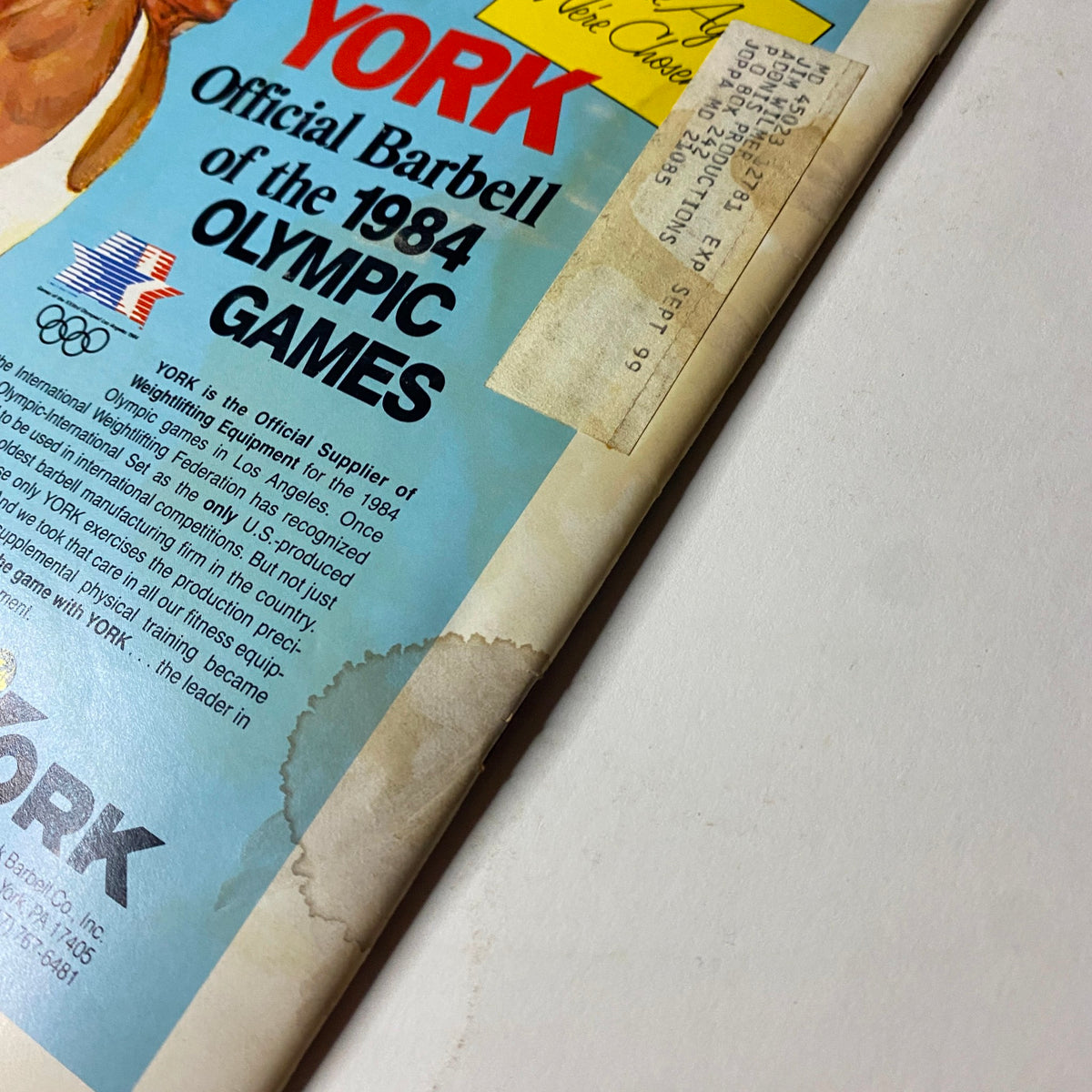 Cover of Muscular Development Magazine December 1983 featuring Jeff King, the 1983 Mr. America, with a vintage advertisement for York official barbell equipment for the 1984 Olympic Games.